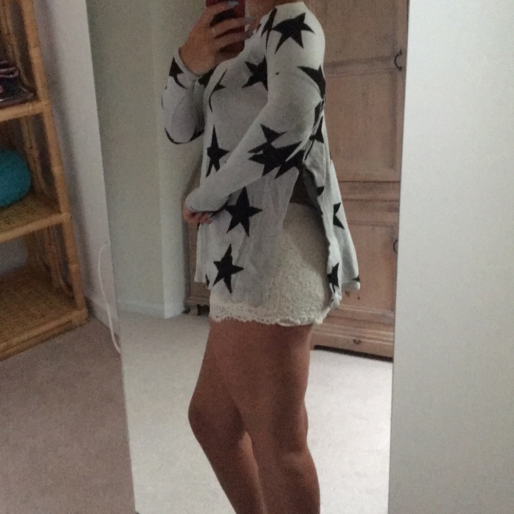 Star sweater with splits on the side